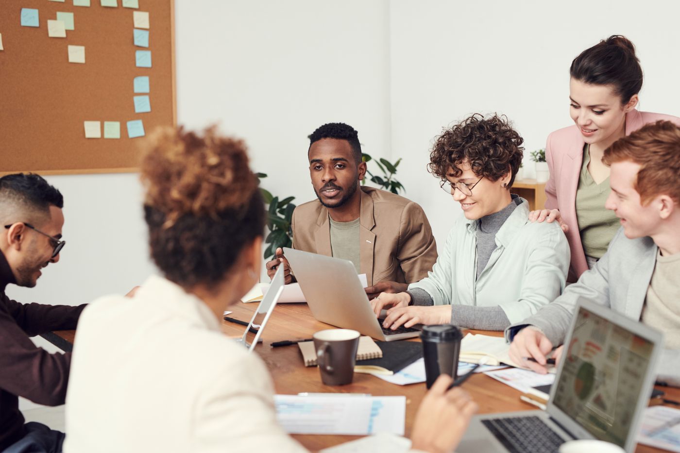 Collaborative deck review session at conference table